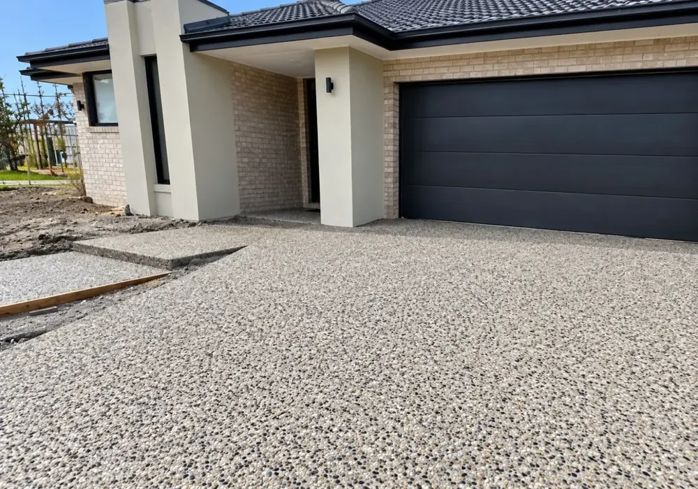 Finished exposed aggregate concrete driveway from a client project in Western Australia